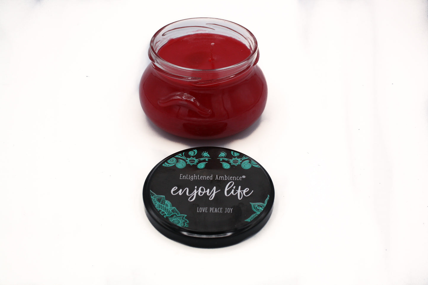 Dickens Christmas Red Soy Candle in squat glass jar with lid.