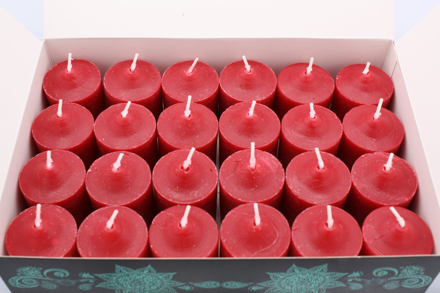 24 Pack of Dickens Christmas votive candles.