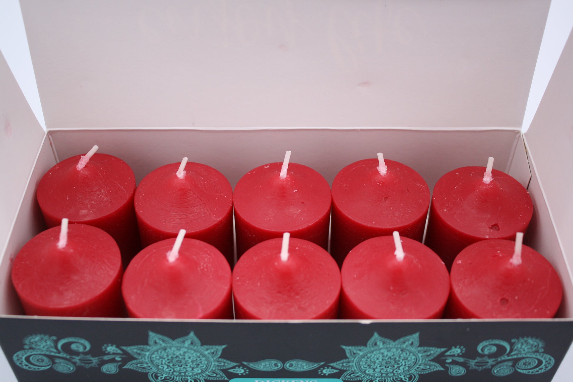 10 Pack of Dickens Christmas votive candles.